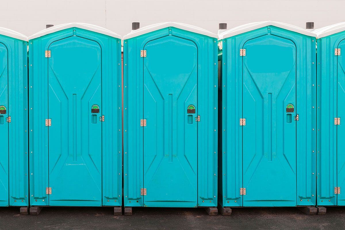Industrial portable restroom units at a plant in Abilene, Texas